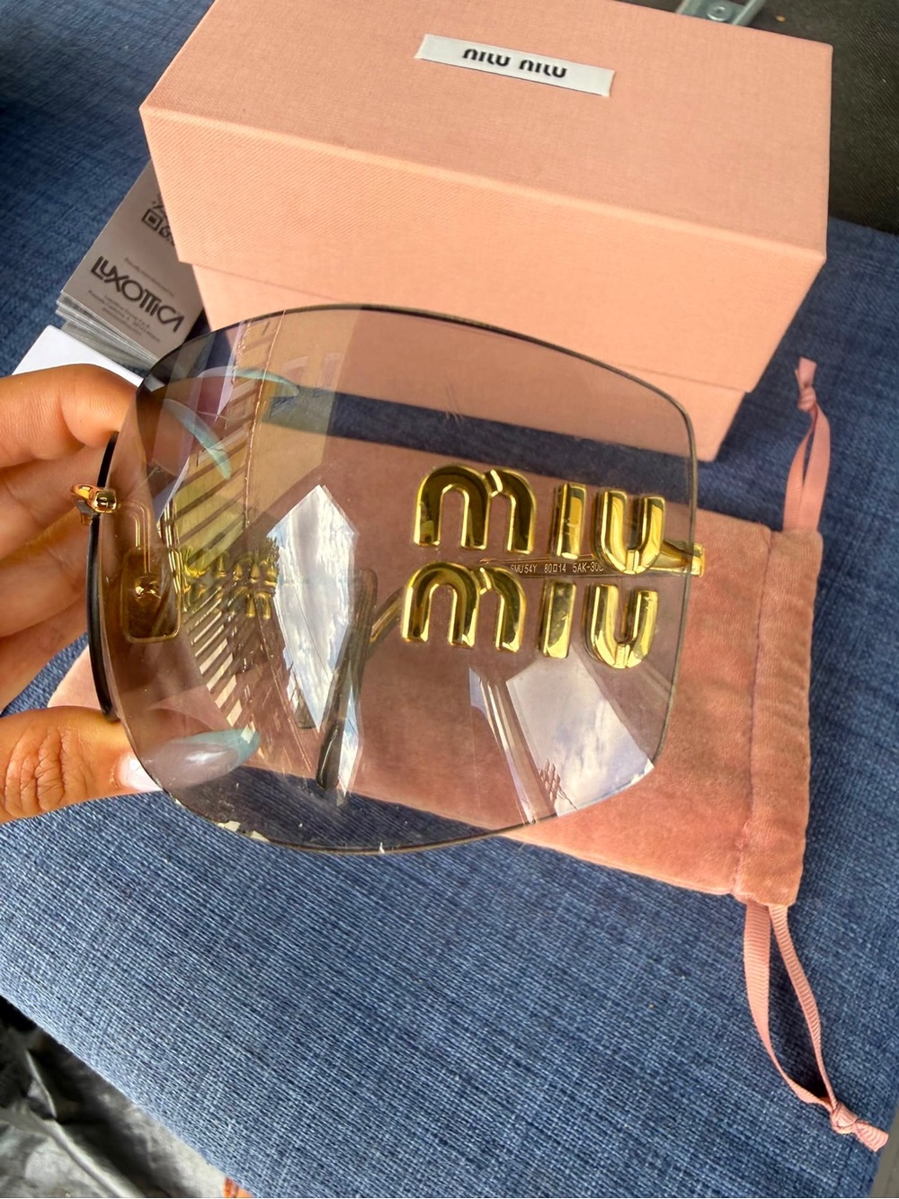Miu Miu Gray Gradient Shield Sunglasses with Gold Logo Accent